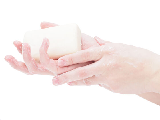 泡沫肥皂手拿着一块肥皂 特写 隔离在白色背景上卫生清洁消毒