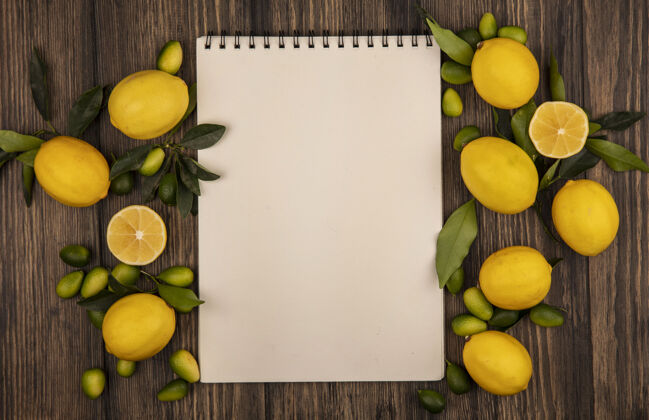 配料顶视图新鲜的彩色水果 如柠檬和金盏花孤立在木制表面与复制空间柠檬农业健康
