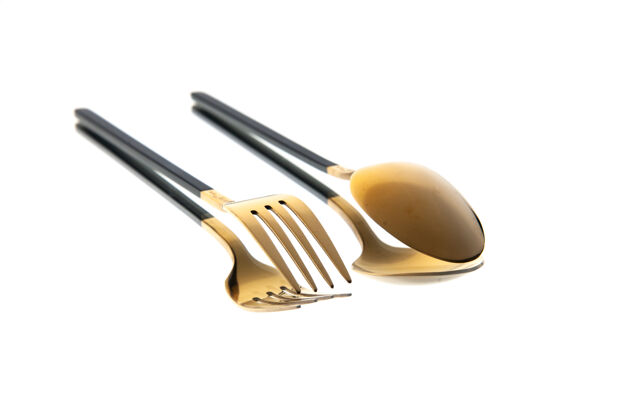 刀白色背景上的金色餐具勺和叉的正面视图设备晚餐餐厅
