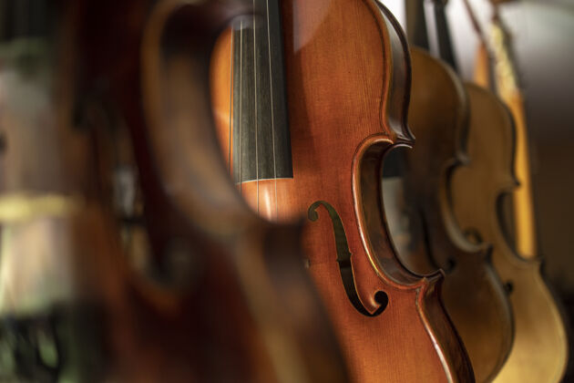 硬木小提琴乐器的特写镜头乐器木头质量