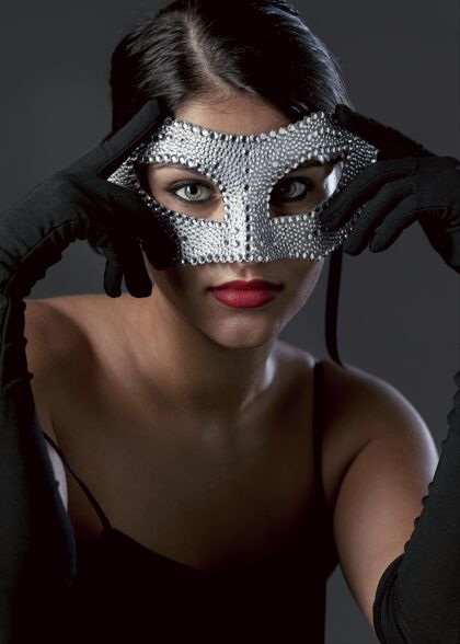 美女戴着狂欢节面具的神秘女人的画像肖像美丽面具