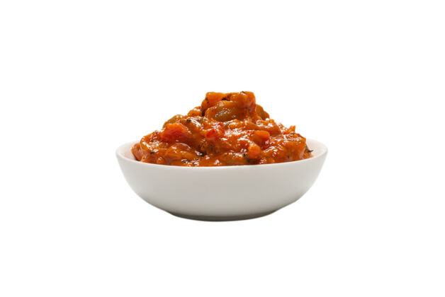 辣椒在一个碗里炖菜 背景是白色的西葫芦胡椒炖