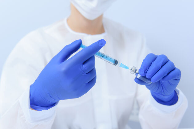 病毒医生给注射器灌药 特写疫苗接种还有免疫接种注射器护理研究