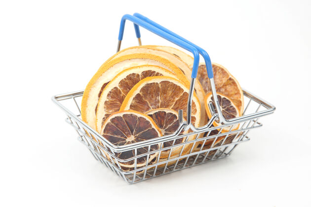 饮食市场篮子里的干柑橘类水果放在一个白色的盘子里表面维生素食品市场香味柑橘