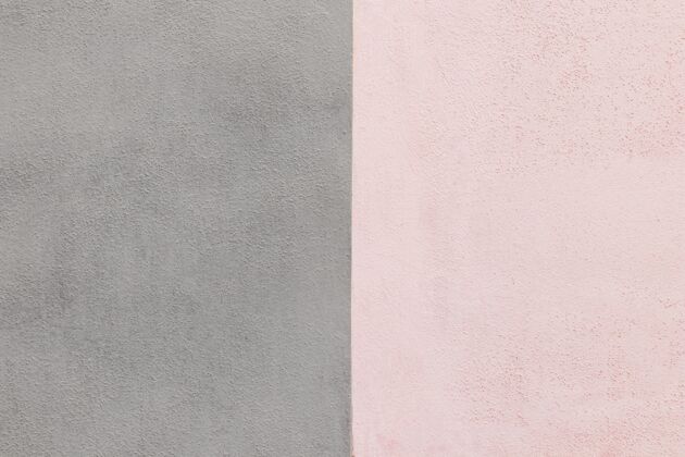 特写灰色和粉色墙壁背景抽象建筑结构