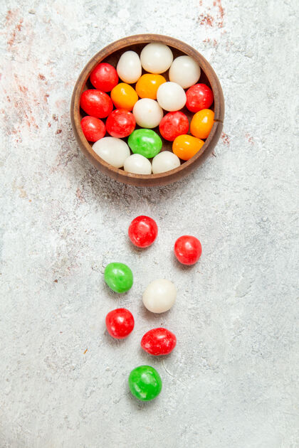 彩虹顶视图彩色糖果白色桌面彩色糖果糖彩虹食品糖五颜六色