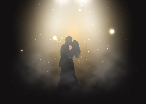 新娘在烟雾弥漫的氛围中 新娘和新郎在聚光灯下跳舞的剪影浪漫庆祝烟