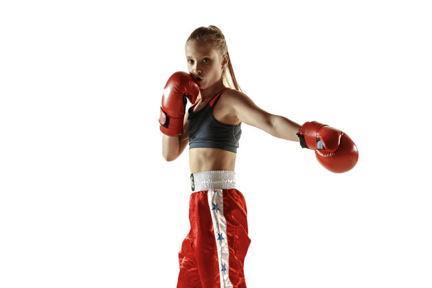 训练年轻女子跆拳道拳手训练隔离在白色背景下运动健康运动员