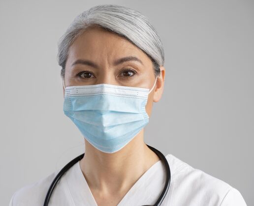 健康专业人士戴着医用面罩的女卫生员画像面罩肖像医生