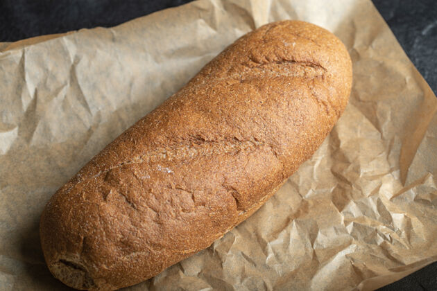 面包特写照片英国布卢默指挥棒面包纸背景面团面粉食品