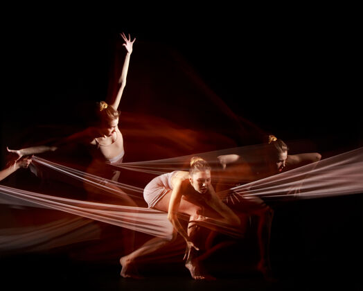 人美丽的芭蕾舞演员与白色面料的性感和情感舞蹈魅力蜘蛛舞蹈