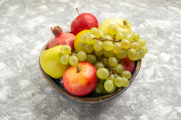 熟正面视图新鲜水果组成苹果葡萄等水果白色背景新鲜醇厚水果成熟颜色维生素观饮食新鲜