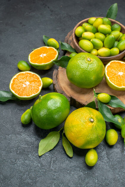 食物侧面特写查看水果板与开胃柑橘类水果叶子叶子橘子特写