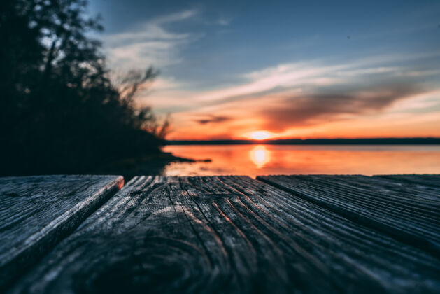 日落日落海滩背景木质表面海滩木板表面