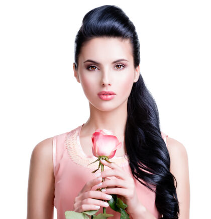 漂亮在白色的墙上画着一幅粉红色玫瑰的性感美女的画像深色性感成人