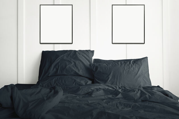 舒适一张深绿色的床上挂着空白的相框睡眠房间清洁