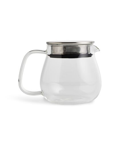 热的玻璃茶壶孤立在一个白色的表面灯光浓缩咖啡把手
