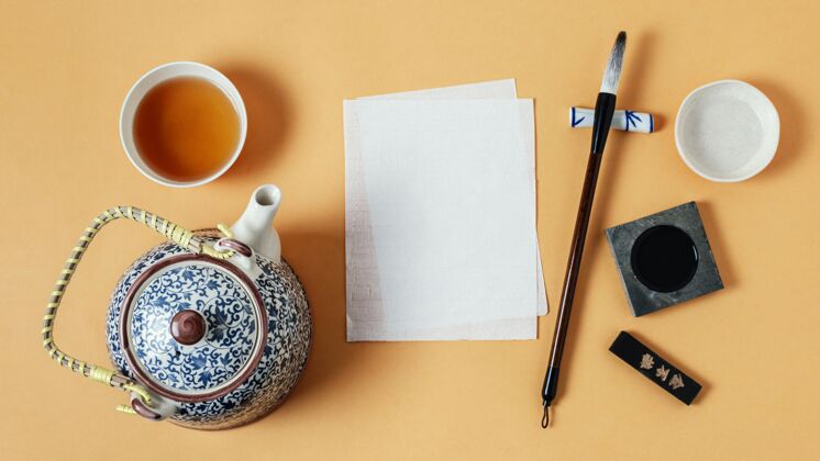 写作用空纸平铺各种中国墨水毛笔创意排列