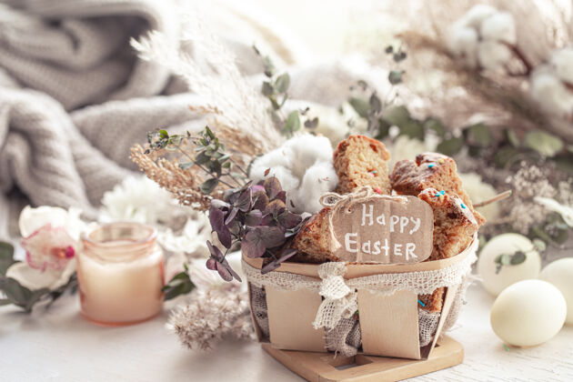 传统复活节静物与节日蛋糕 鸡蛋和鲜花件复活节假期的概念面包房复活节符号