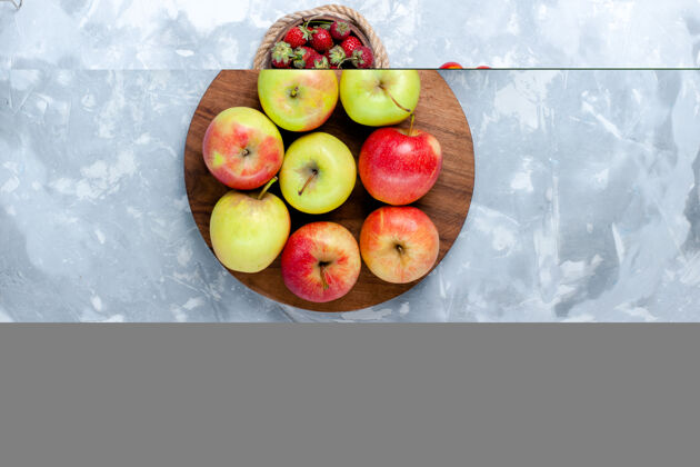 维生素半顶视图新鲜苹果成熟醇厚水果浅白色桌面水果食物维生素颜色新鲜树半顶水果桃